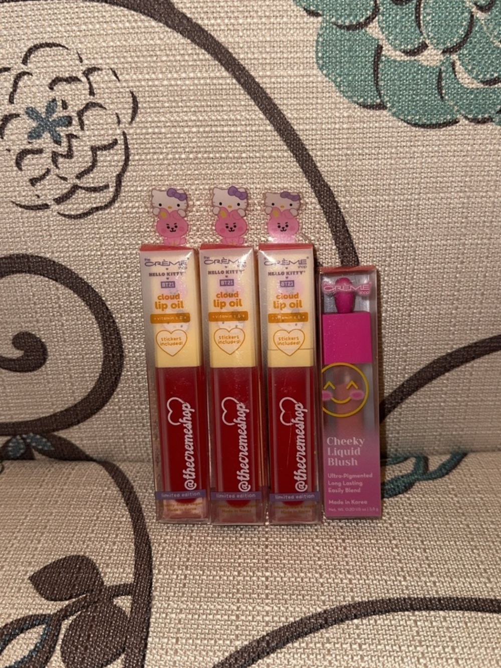 Crème Hello Kitty Red & Pink Cloud Lip Oil Trio with Pink Cheeky Liquid Blush